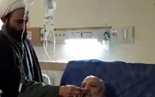 صدور امر لاعتقال رجل دين ايراني رش عطر على مربض قال انه يشفى الكورونا