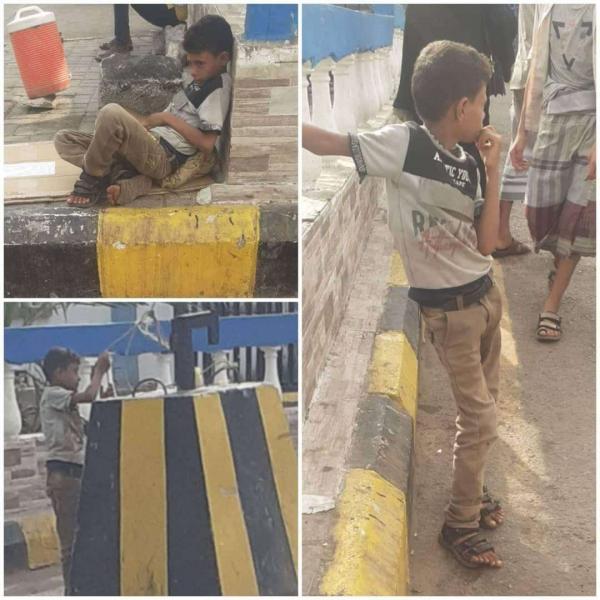 صورة محزنة لنجل الطفل الشمالي الذي أحرق والده نفسه أمام مبنى المجلس المحلي بعدن