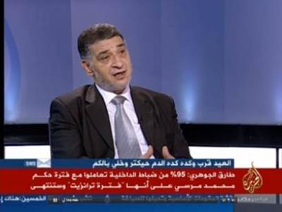  قائد حراسة مرسي يفجر حقائق مذهلة حول وزير الداخلية والضباط الملتحين