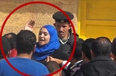 بالفيديو.."فتاة" تصفع ضابط شرطة بسبب تحرشة بها