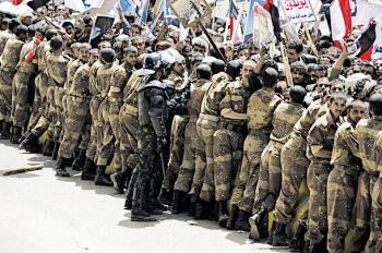 تحديث مستمر: مجزرة جديدة ترتكبها قوات محمد خليل اللواء المنشق عن الفرقة الاولى والتي تسيطر على شارع العدل والإذاعة ومستشفى الكويت