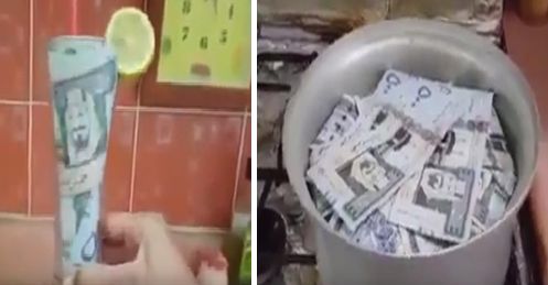 بالفيديو .. سعودي يتباهى بـ “طبخ” أوراق نقدية من فئة 500 ريال في قدر “كبسة”