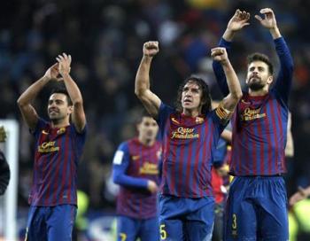 فابريجاس يقود برشلونة للفوز على ريال مدريد 3-1 في الدوري الاسباني
