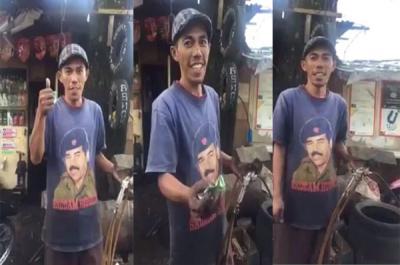 شاهد: ردة فعل مواطن سعودي بإندونسيا وجد شاب يرتدي تي شيرت عليه صورة صدام