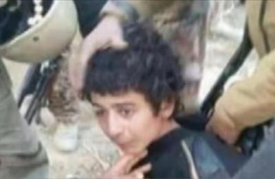 قتل طفل عراقي سنّي وسحقه بدبابة في الموصل (فيديو)