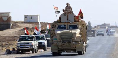 أمريكا تهدد بـ”قصف” الحشد الشعبي إذا لم ينسحب من كركوك