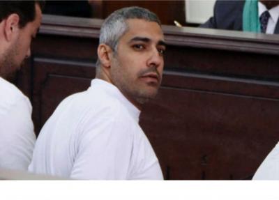 صحفي االجزيرة "محمد فهمي" يطلب التنازل عن جنسيته المصرية للإفراج عنه