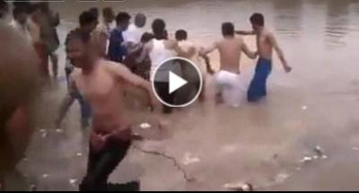 لحظات مؤلمة اثناء إخراج جثة غريق في احد حفريات العاصمة صنعاء
