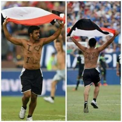 بالفيديو : يمني يقتحم مباراة "ريال مدريد" حاملاً علم اليمن ويفاجئ العالم بعبارات قوية كتبها على صدره