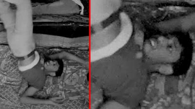 شاهد بالفيديو : شبح يجر شاباً من ساقيه أثناء نومه وكاميرات المراقبة ترصده 